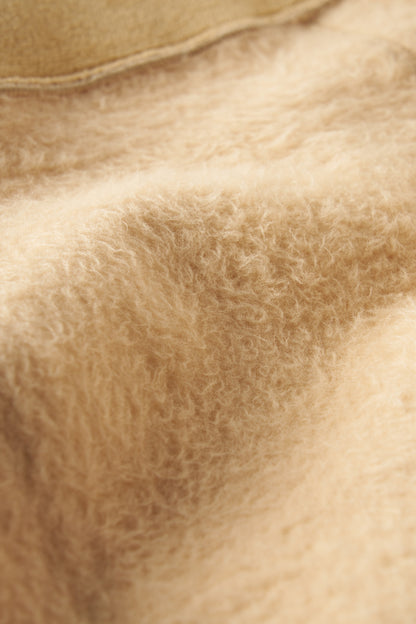 Close-up of soft fleece lining of a model wearing Hongteya Fleece Lined Caramel Fake Translucent V Waist Thermal Tights