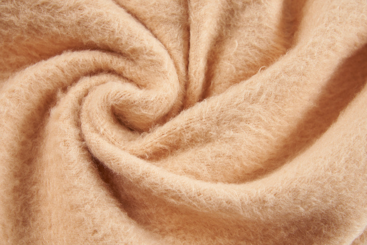 Close-up of the soft brushed fleece lining used in HONGTEYA thermal tights